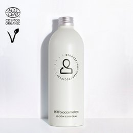Organic body lotion in a 500 ml refill bottle. Fragrance-free, vegan, and made with natural ingredients.