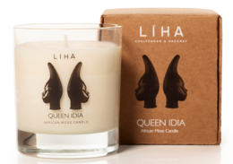 A tall, round, beige candle in a glass container with a black label featuring the LIHA brand name and "Queen Idia" text. The candle is packaged in a brown cardboard box with the LIHA brand name and "Queen Idia Candle 220 grams" printed on it.