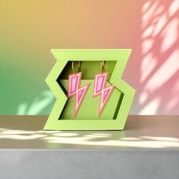 Neon pink lightning bolt stud earrings, lime green geometric hexagon shape, electric flash design