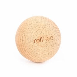 A round, wooden ball with the text "rollholz" printed on it. The ball appears to be made of natural wood, likely beech, ash, walnut, or oak based on the product variants listed. This wooden ball is a yoga accessory or prop.