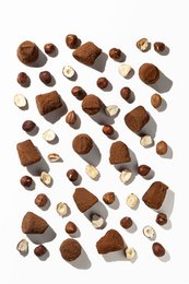  Hazelnut chocolate truffles in various sizes, including 250g, 500g, 1kg, and 3kg. The truffles are made with a rich, dark chocolate coating and a smooth, creamy hazelnut filling.