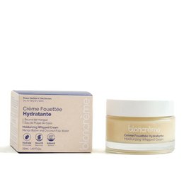 Whipped moisturizing face cream in a jar with a floral pattern design. The cream is formulated to hydrate and nourish the skin.