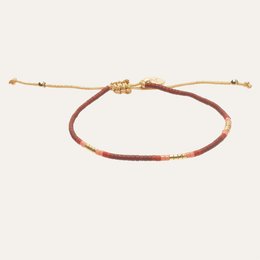guldarmbånd med rødt