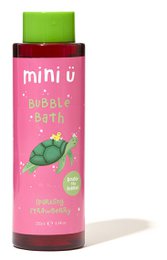 Pink bubble bath foam with green turtle design, playful children's bath product, fruity scent