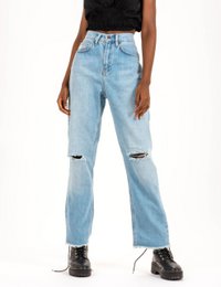  High-waisted flare jeans with a loose, relaxed fit. Made of light blue denim with distressed details.