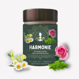 Harmony - herbal tea in a tea caddy. Loose leaf tea blend with green tea, herbs, and dried fruit pieces. Earthy, floral, and slightly sweet flavor profile.