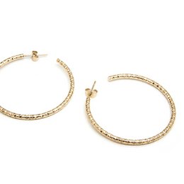 Large gold-tone hoop earrings with a textured, hammered finish. The hoops have a classic, elegant design that is suitable for everyday wear.