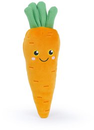 Orange carrot squishy plushie with green leaves, cute smiling face, soft toy vegetable.