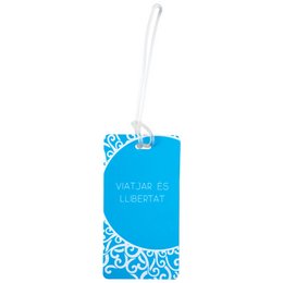 Rectangular turquoise luggage tag with the text "viatjar és llibertat" printed on it, which translates to "travel is freedom" in Catalan.