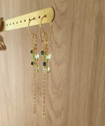 18K goud vergulde oorbellen met Peridoot groene vlinders en Smaragd kristallen