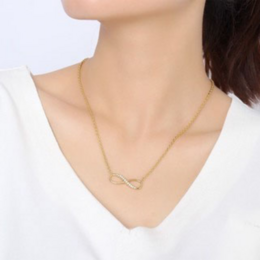 Gold plated necklace with infinity symbol and sparkling crystals.