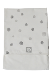 A soft, white baby bed sheet with gray polka dot pattern. Suitable for cribs and toddler beds.
