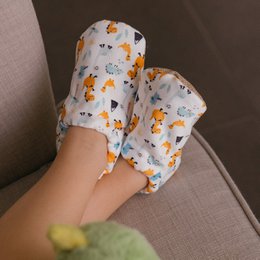Chaussures de bébé - heureux dino