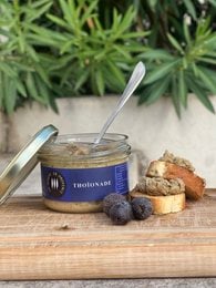 A 90g jar of Thoionade, a savory spread made with high-quality ingredients.