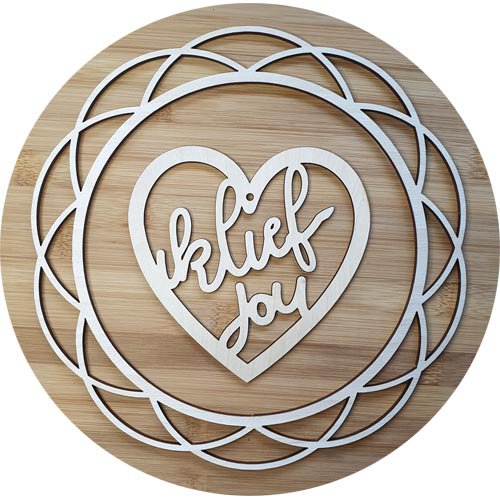 Wooden love heart with texts. "I'm on you" and "I love you".