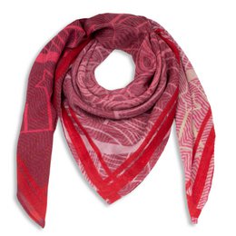A large, square red scarf with an intricate, abstract pattern featuring circular and geometric designs. The scarf appears to be made of a soft, silky material.