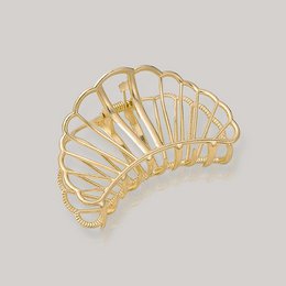 Gold-toned hair clip with a fan-shaped design, suitable for holding back hair.