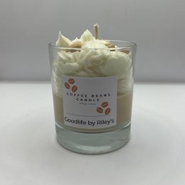 Creamy, vanilla-scented candle with coffee bean accents.