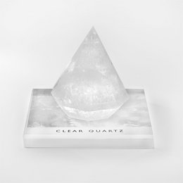 Clear quartz crystal, pyramid-shaped, transparent, natural mineral