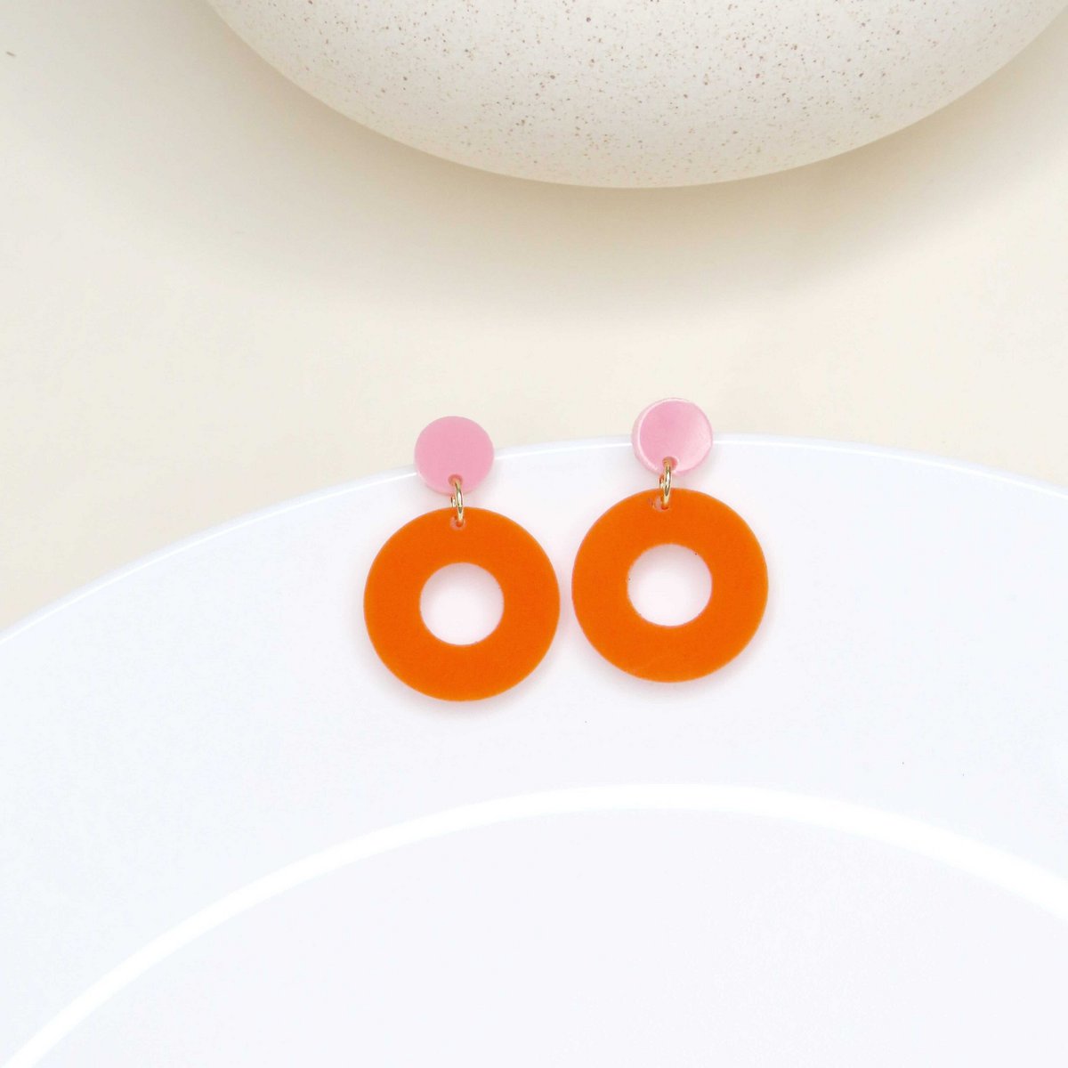 Colorblock Circle stud earrings in pink and orange