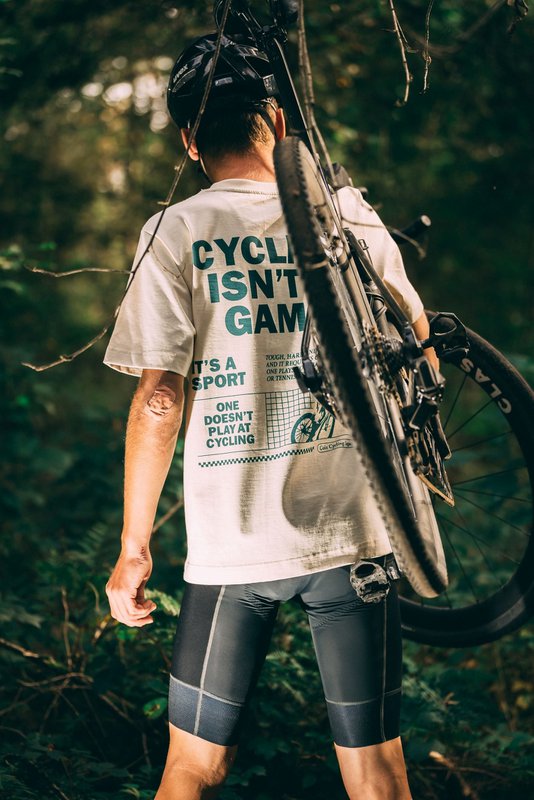 Kolarstwo to nie gra, oversize'owa koszulka rowerowa unisex (naturalna - zielona)