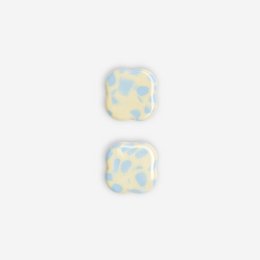 Stud earrings with a core ocean dott pattern in shades of blue and white.