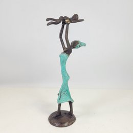 Scultura in bronzo "Baby in the air" di Soré | diverse dimensioni e colori