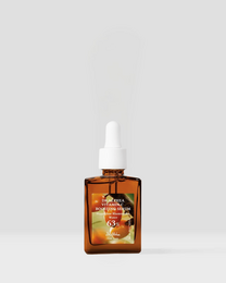 Radiance & anti-dark spot serum with vitamin C. Amber glass bottle with dropper. Vegan, cruelty-free, and paraben-free.