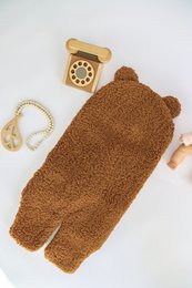 Couverture d'emmaillotage en peluche