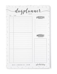 A black and white daily planner notepad with sections for daily tasks, notes, and events.