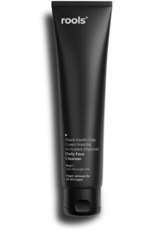 Black daily face cleanser in a tube. Suitable for all skin types.