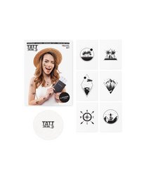 Temporary tattoo travel set with various designs including sun, moon, stars, and other symbols.