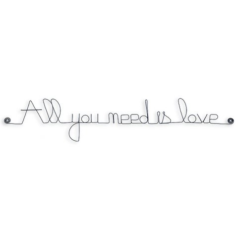 Wire wall writing "All you need is love"
