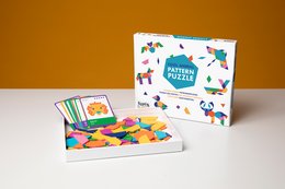 Tough Animal Patterns Puzzle, a colorful and challenging jigsaw puzzle featuring a variety of animal-inspired shapes and patterns.