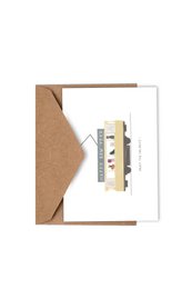 A festive holiday card featuring a minimalist design with a white background, a brown envelope, and a decorative element resembling a Christmas tree or ornament.
