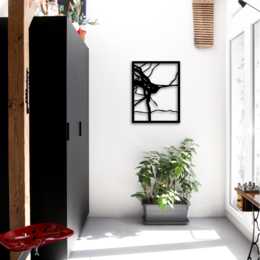 Metal wall art with abstract geometric design, available in multiple sizes.