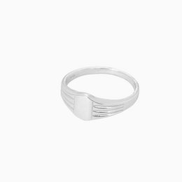 Signet ring with silver-toned stripes, part of a stackable ring set. Suitable for everyday wear.