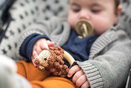 Crocheted grabbing toy hedgehog HARRY in brown
