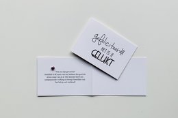 Congratulatory card with handwritten text "Congratulations!! You did it."