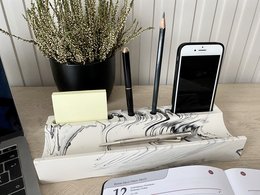 Marble-patterned desk organizer with phone and pen holders, providing a stylish and functional storage solution for your workspace.