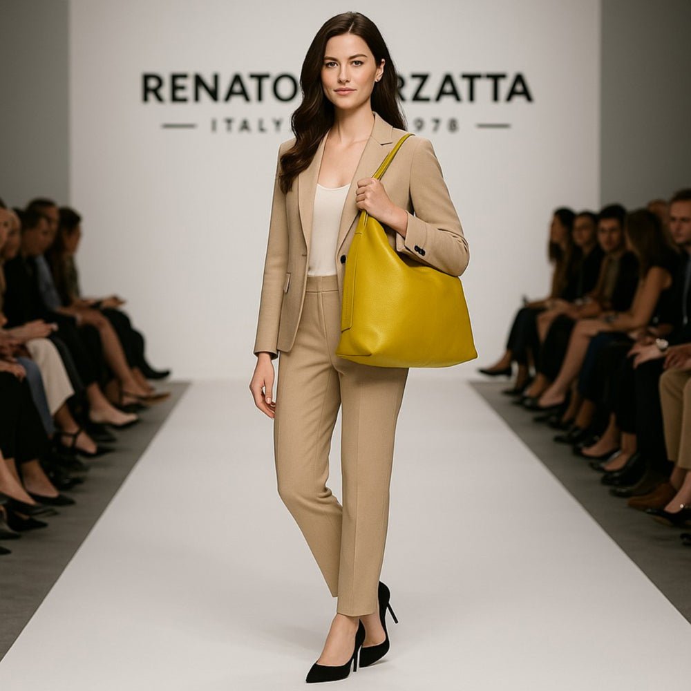 RB1017AR | Soft women's shoulder bag in genuine leather Made in Italy with single handle and removable shoulder strap. Attachments with shiny gold metal snap hooks - Mustard color - Dimensions: 36 x 40 x 13 cm
