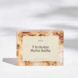 A natural, handmade 7-herb soap bar with a blend of herbs and essential oils for a soothing and nourishing cleansing experience.