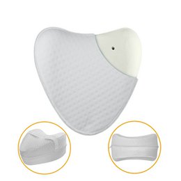 Heart-shaped cushion with textured surface, designed for knee support and comfort.