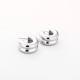 Silver hoop earrings with a chic, modern design. The half-hoop shape creates a sleek, minimalist look. Suitable for everyday wear.