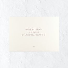 A simple, elegant love card with a handwritten message on a cream-colored card.