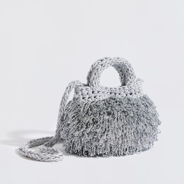 “Pebble metallic” handcrafted clutch with crossbody strap gold