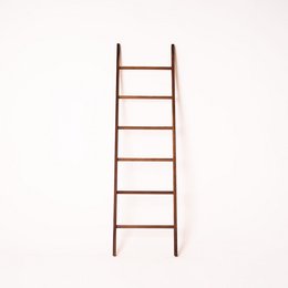 Solid walnut clothes ladder and towel rack, featuring a simple, minimalist design with a natural wood finish.