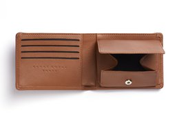 Minimalistisk guldpung med møntlomme
