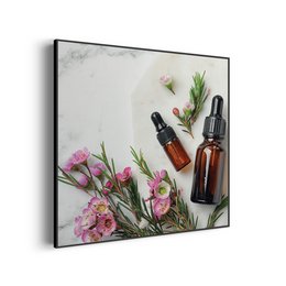 Painting featuring pink flowers, green leaves, and essential oil bottles on a marble background. Includes colors, materials, and style details to enable semantic search.