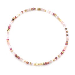  Steel bracelet with faceted glass beads and natural stones in various colors.